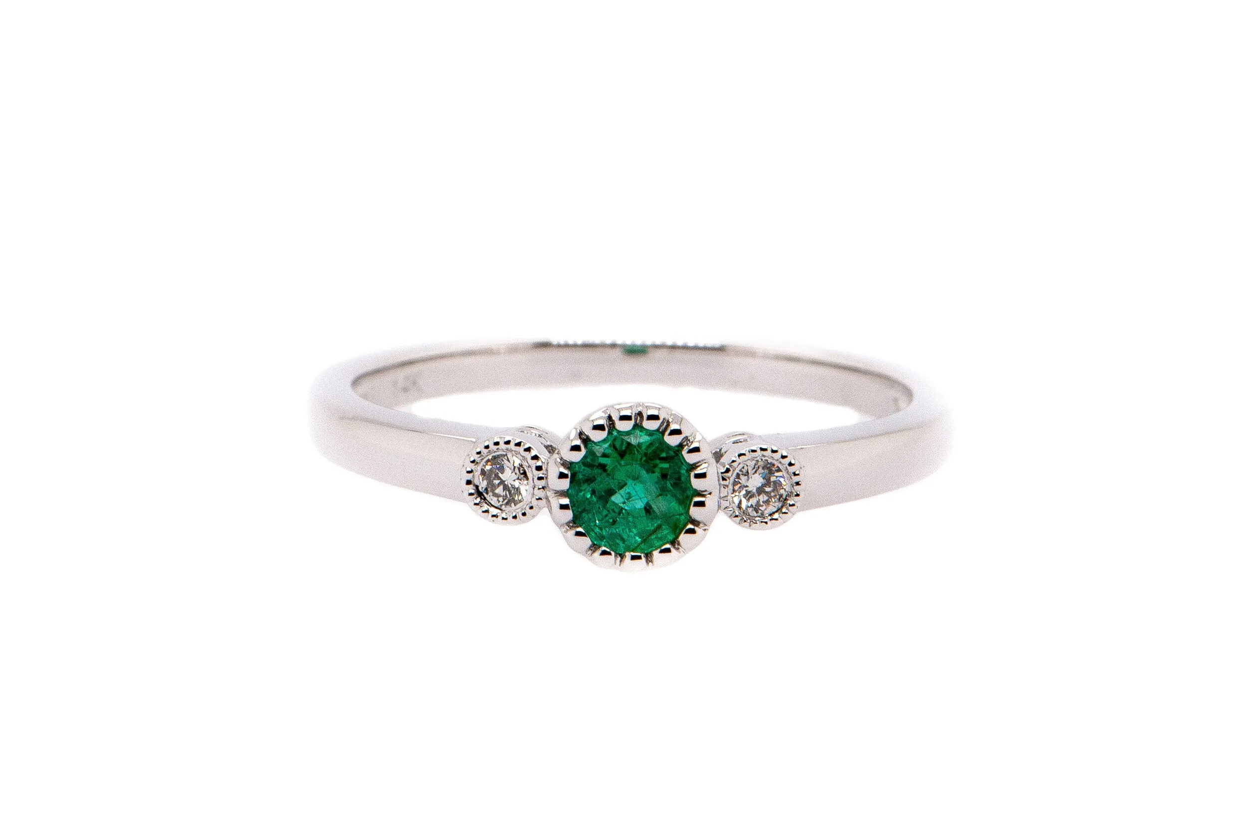 Emerald and diamond ring